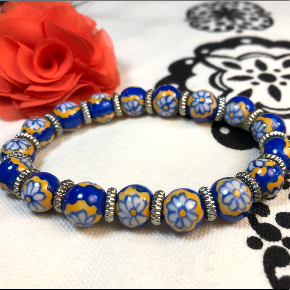 Blue Beaded Bracelet; White Flowers